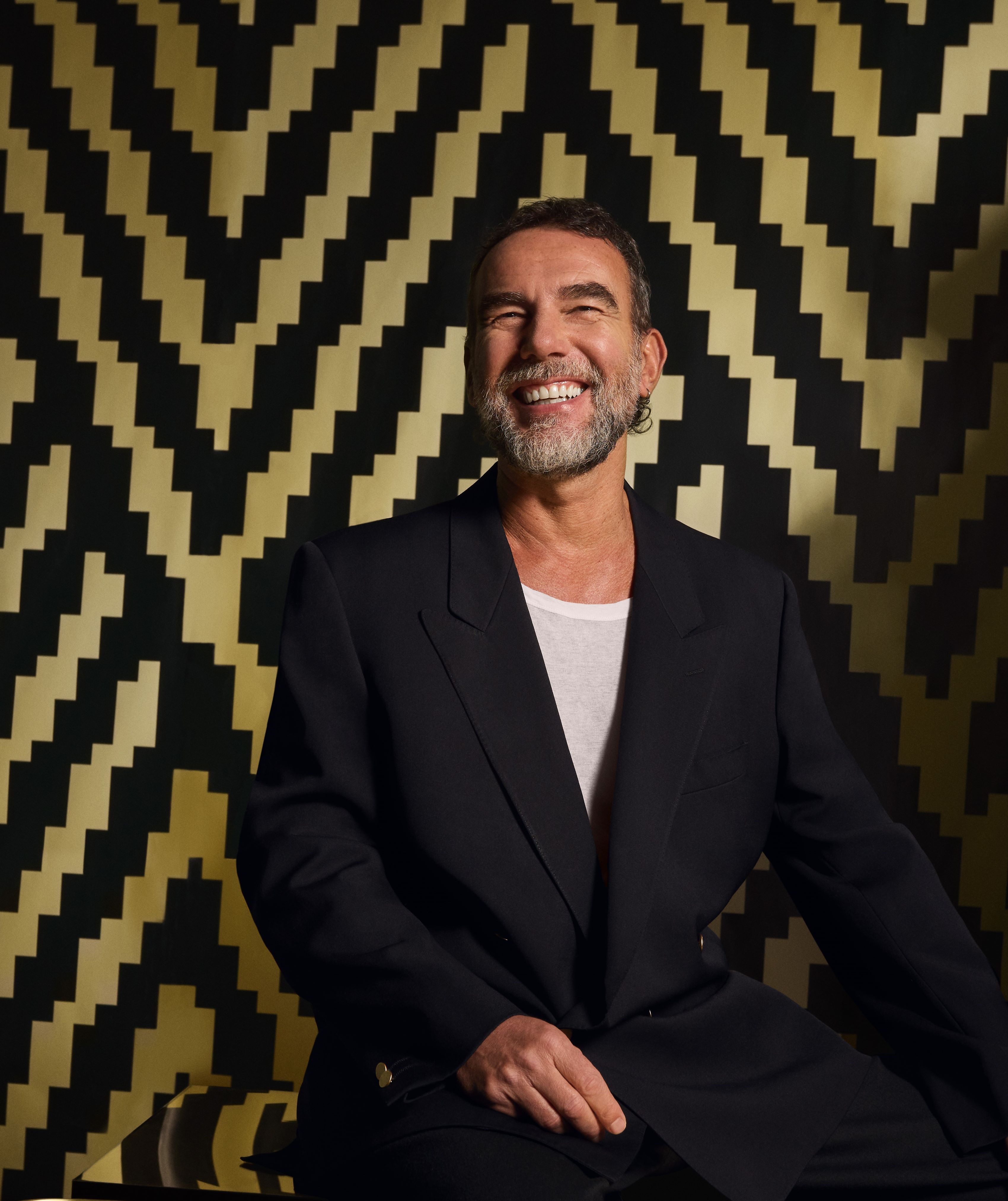 Seletti designer in black and gold background